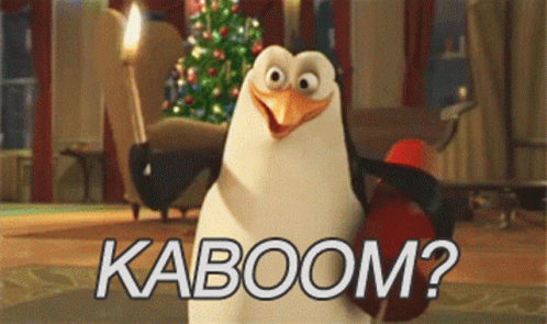 a penguin in the middle of a room that says kaboom?