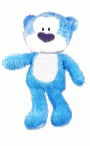 a teddy bear with its arms open is smiling