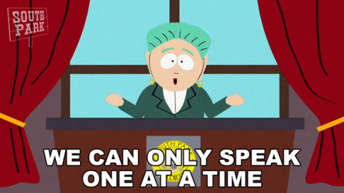 a cartoon character is speaking at a podium in front of a curtained area