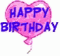 a happy birthday balloon shaped like a heart