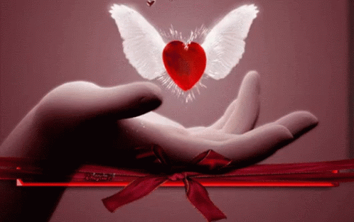 two hands holding onto each other with blue hearts and angel wings