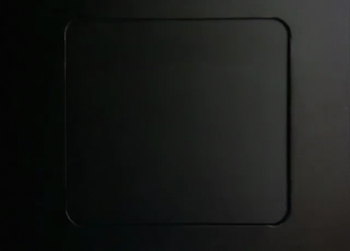 black square object with white line and light in the middle