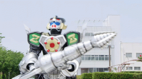 a picture of a giant robot standing with its arm out