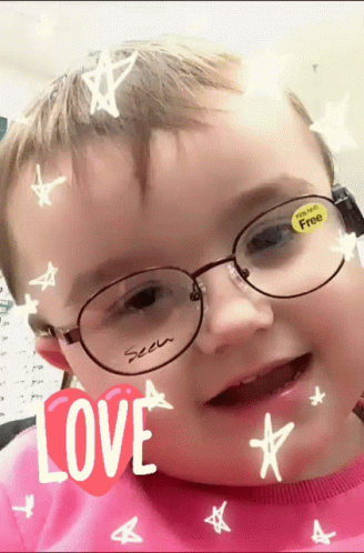 a child in glasses and a star design with words love