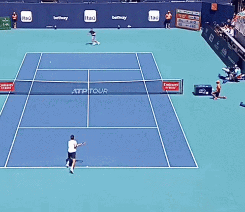 a tennis match with the player on the tennis court