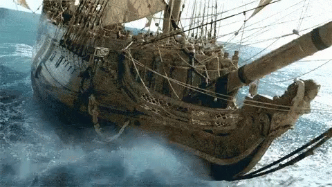 a ship sailing through a body of water