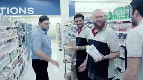 three guys in a walmart store buying items