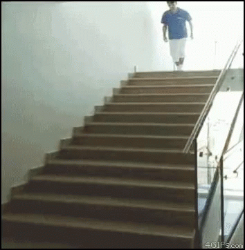 a man walking up stairs with a backpack