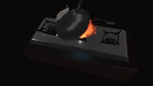 a fryer on a black counter with blue flames in it