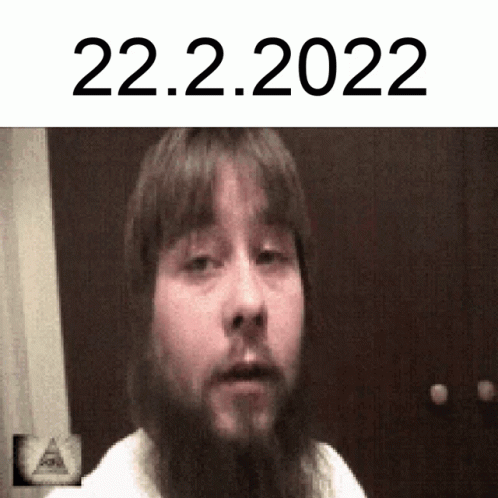 a blurry image of a person standing in front of a doorway with the text 22 2 2012 on it