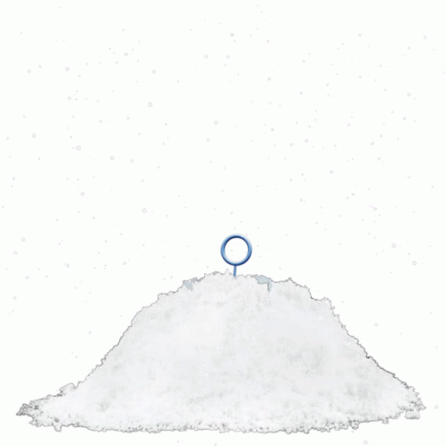 a mound of white powder with a gold ring on top