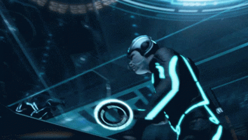 a futuristic man is playing with a disc on a stage