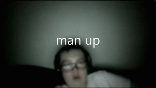 man up blurry pograph, with white text below a male in glasses