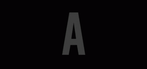 the initial letter a is made of thin dark gray paper