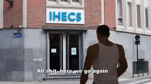 a man walking past a hfcs store on the street