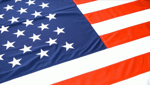 a close up of an american flag with white stars