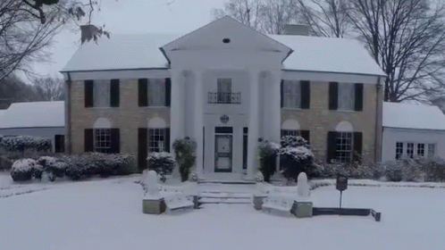a large home that is covered in snow
