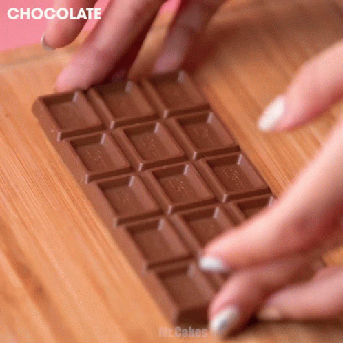 woman hands using a keyboard made out of chocolate