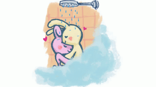 a blue and pink bunny in front of a shower head