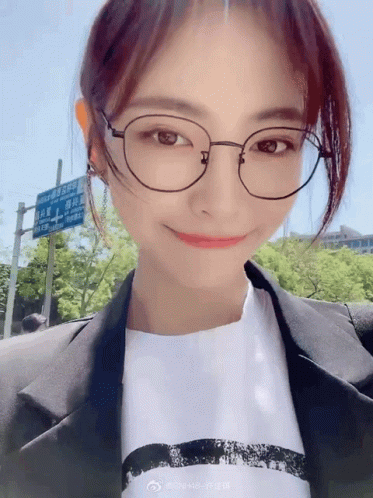 a digital avatar of a woman wearing glasses