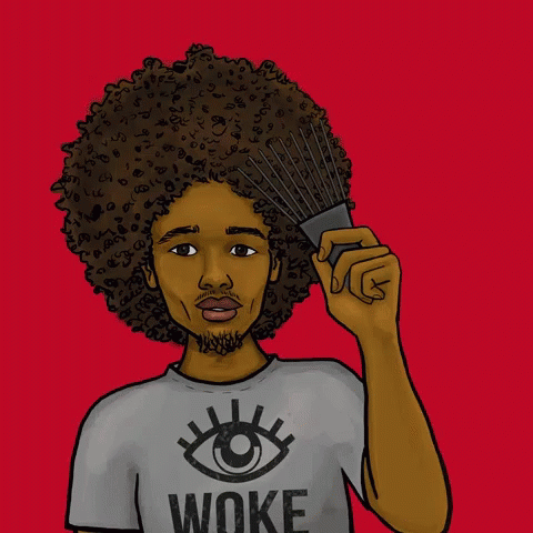 a close up of a person with an afro holding a fan