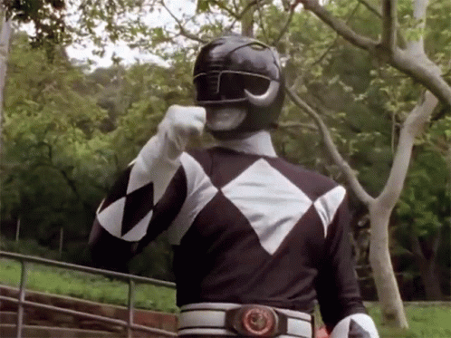 a man dressed up in a power ranger costume