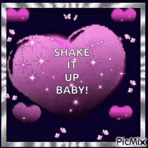 a heart shape balloon that says shake it up baby