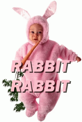 a baby wearing an evil bunny costume, holding a toothbrush