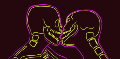 two aliens are touching each other in the dark