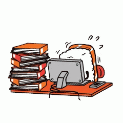 a stack of books sitting on top of a computer monitor
