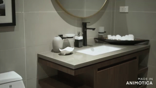 a bathroom with a mirror and a sink