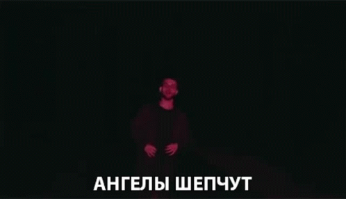 man in dark room with the words russian