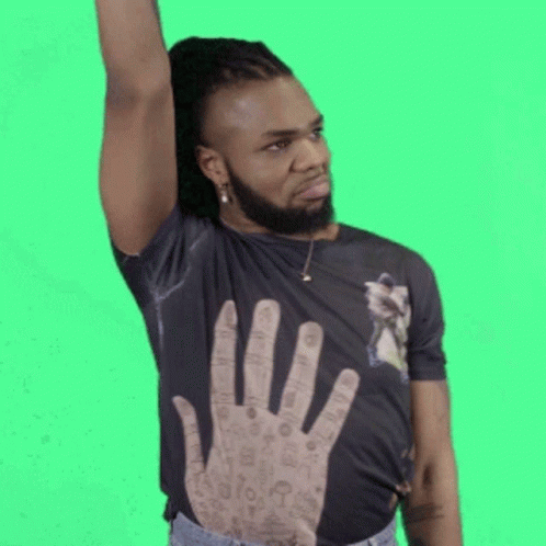 a young black man raising his hand up