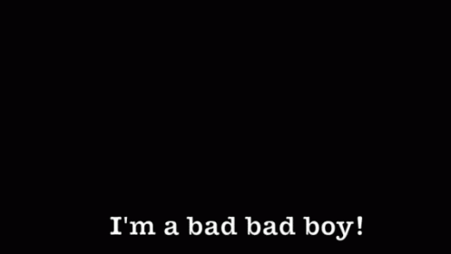 the back of a black background with white text that says i'm a bad bad boy