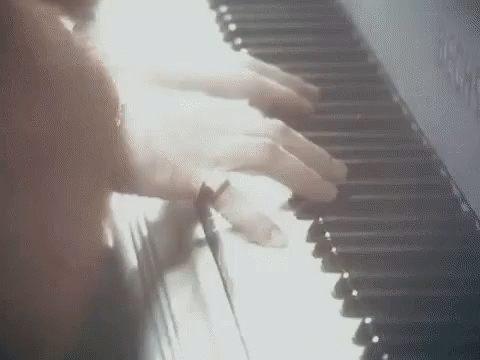someone playing the piano with their hands