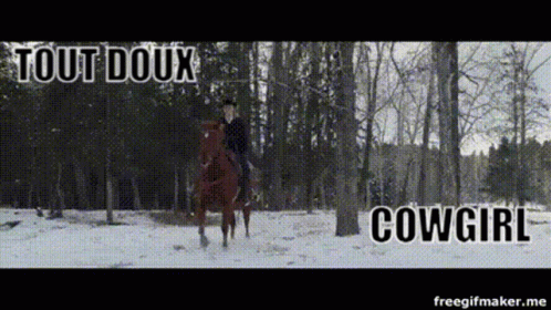 the words'it out dux cowgirl'on a black and white po of a man riding a horse in a snowy area