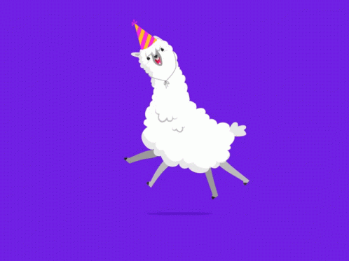 a white llama with a party hat on