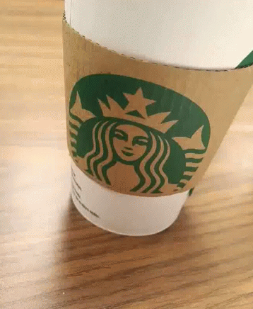 starbucks coffee cup on a table