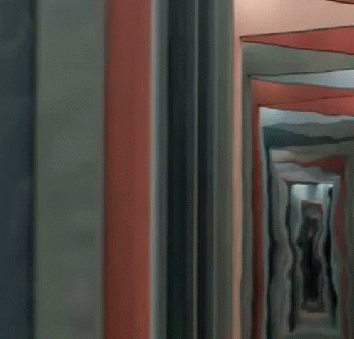 a hallway in an office building has striped walls