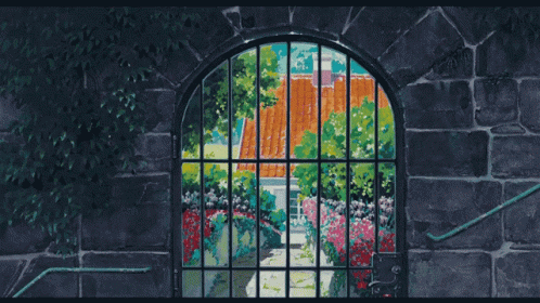 a painting is hanging inside a stained glass window