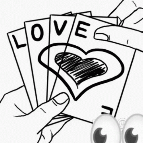 a hand holding four sheets of paper with the words love