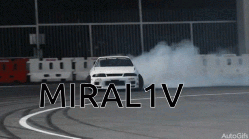 a car going down a track with smoke behind it