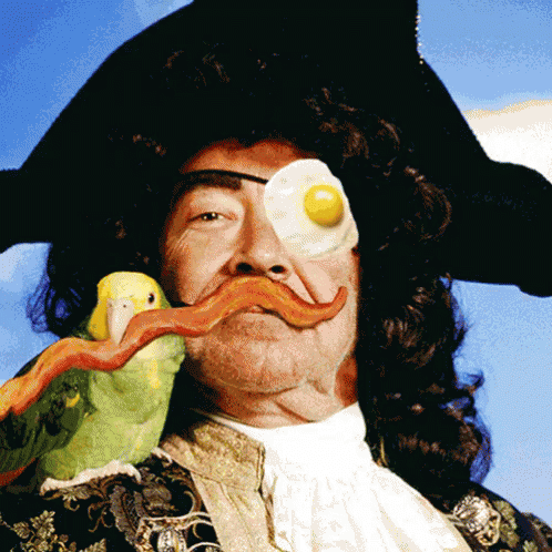 a man with an evil face and long black hair, has an evil bird as its nose