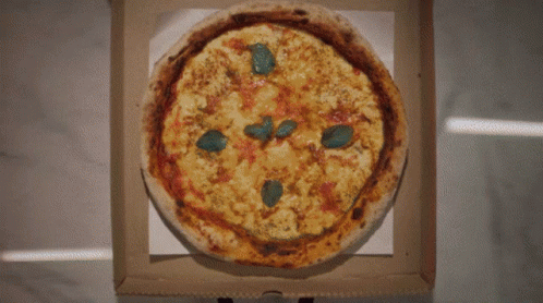 a very large pizza with holes in it