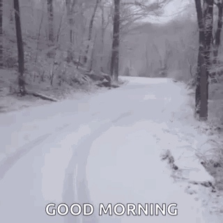 an image of the words good morning over snowy road