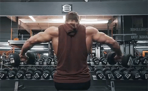 a man with no arms in the gym