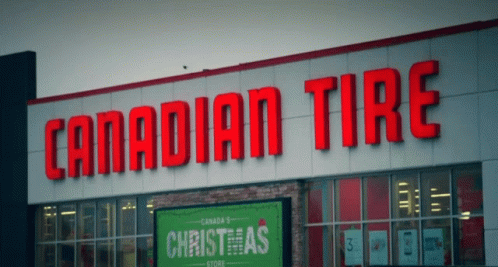 a canadian tire sign is projected on a building