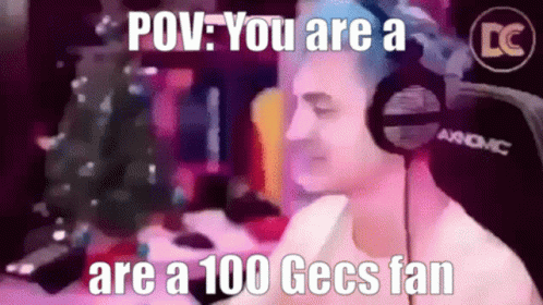 man with headphones looking at soing with words saying pov you are a are a 100 ces fan