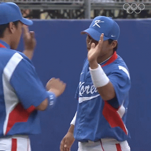 two players have their faces painted to look like baseball players