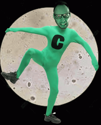 a man in green clothes is performing a dance in front of a full moon